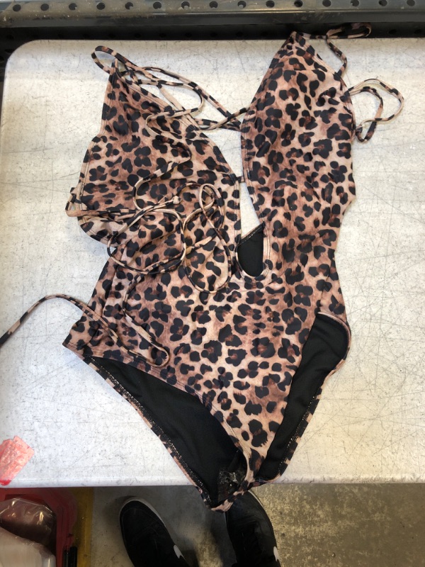 Photo 1 of 1 PIECE BATHING SUIT 
LARGE 