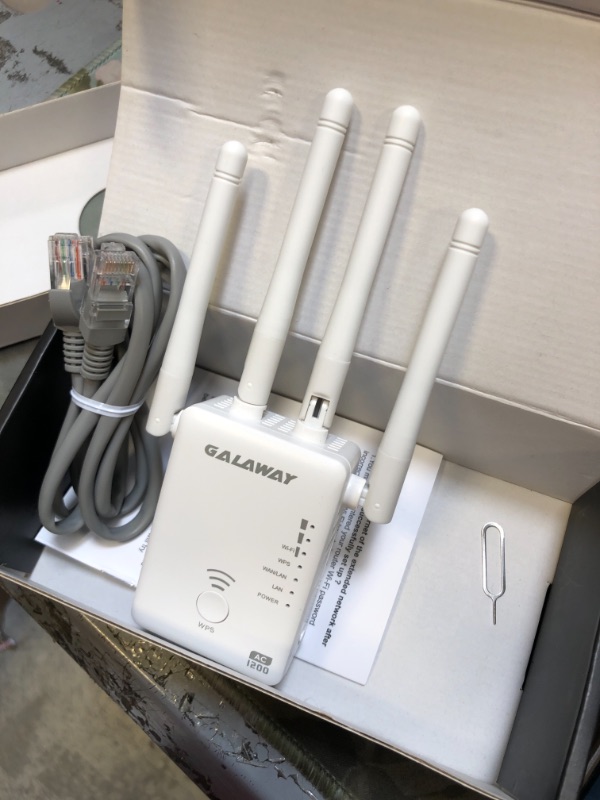 Photo 1 of GALAWAY WiFi Extender, Mini WiFi Range Extender Upgrade 2.4GHz WiFi Repeater 360
