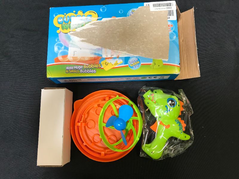 Photo 2 of Dinosaur Bubble Gun Machine for Kids Bubble Blower Toy for Toddles Party Favors with 8 Floz Bubble Solution - Birthday Gift for 3 4 5 Year Old Boys Girls Outdoor Toys Summer Water Toys Outside Toys