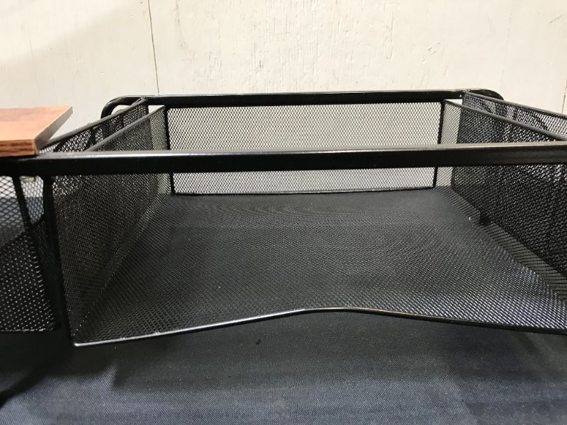 Photo 4 of BLACK METAL STAND WITH SIDE HOLDERS AND WOODEN TOP. ITEM IS DAMAGED, DENT TO METAL AND MISSING SCREWS TO WOODEN TOP