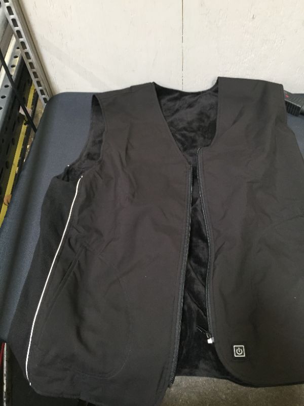 Photo 1 of women's heated vest (missing charger) (unable to test)
size 2XL