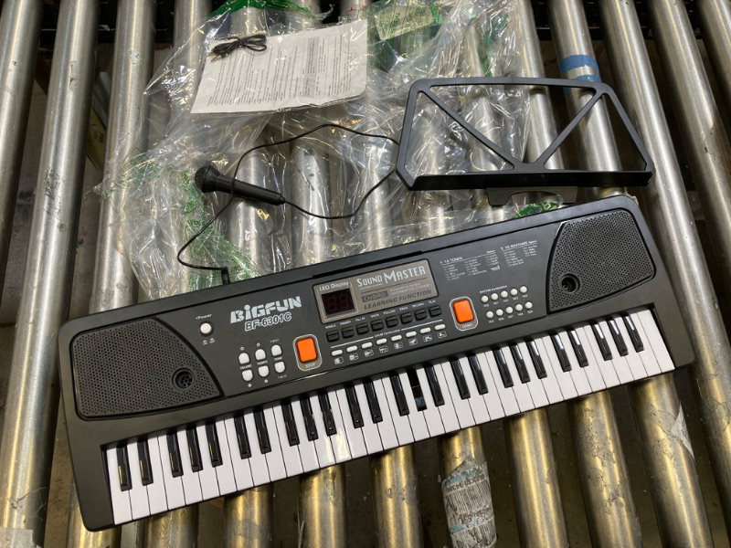 Photo 2 of BigFun BF-6301C Rechargeable Electronic Keyboard 61 Keys with Microphone *** DAMAGED -- SEE PHOTOS, MISSING KEY