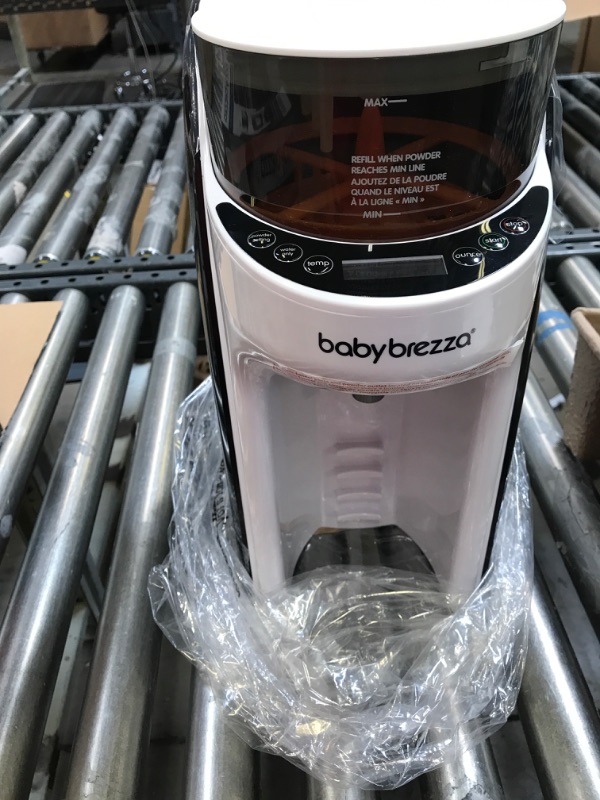 Photo 1 of Baby Brezza Formula Pro FRP0046 (Advanced) bundled with Instructions manual