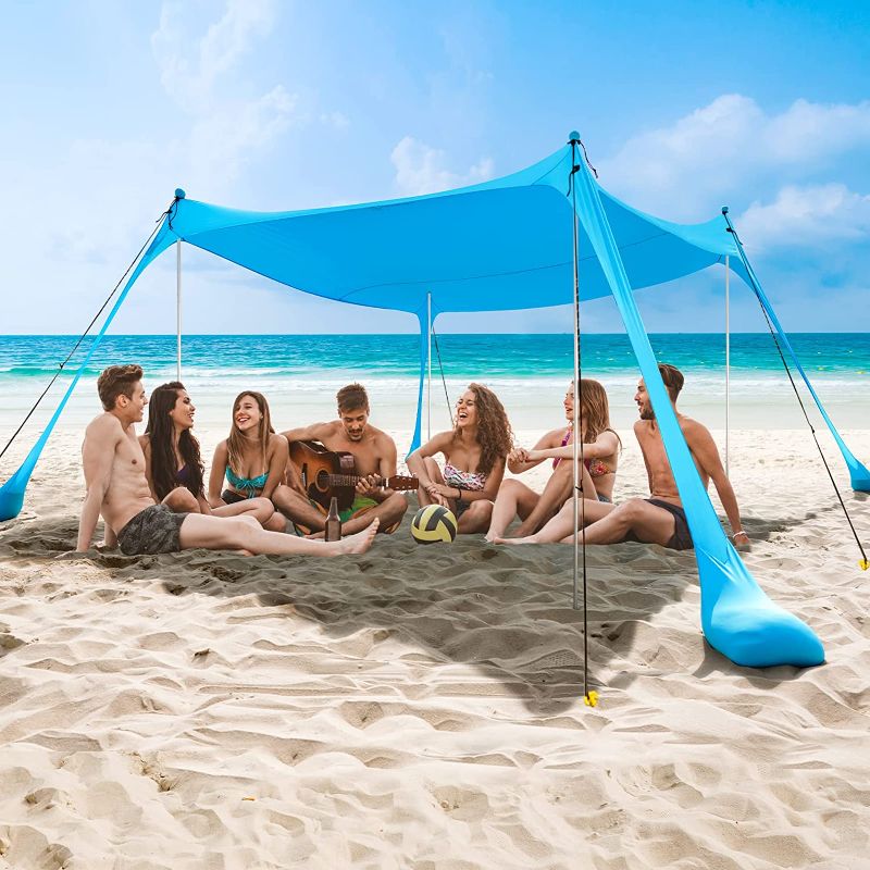 Photo 1 of  Beach Tent Pop Up Sun Shelter, Portable Beach Canopy Shade with 4 Poles for Beach, Camping, Fishing, Backyard and Outdoor
