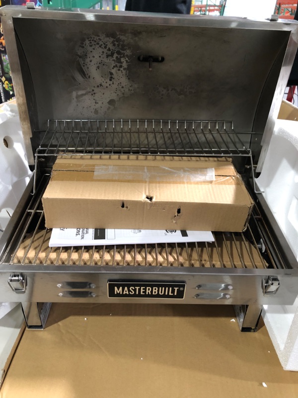 Photo 2 of **USED**Masterbuilt MB20030819 Portable Propane Grill, Stainless Steel New Version Propane Grill