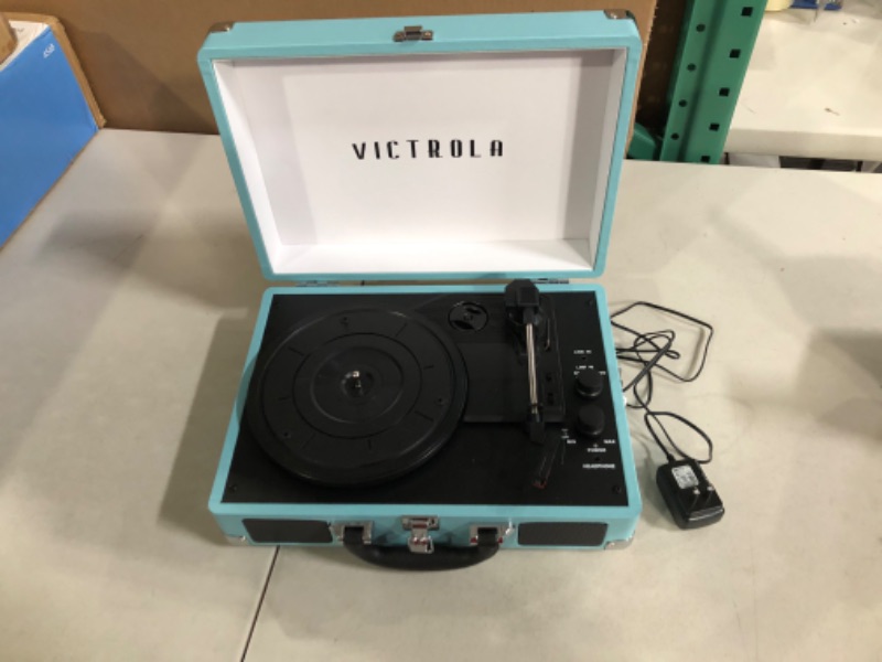 Photo 2 of **SEE NOTES**
Victrola Vintage 3-Speed Bluetooth Portable Suitcase Record Player with Built-in Speakers | Upgraded Turntable Audio Sound| Includes Extra Stylus | Turquoise, Model Number: VSC-550BT