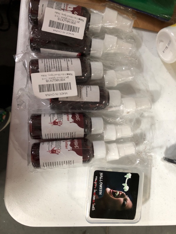 Photo 2 of 6PCS Blood Splatter, 2.0 fl oz Fake Blood Spray, Makeup Blood Splatter,Halloween Liquid Blood for Clothes, Zombie, Vampire & Monster SFX Makeup & Dress Up

halloween vampier teeth 