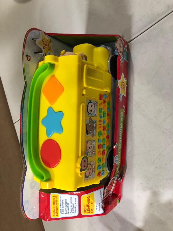 Photo 1 of CoComelon Musical Learning Bus, Number and Letter Recognition, Phonetics, Yellow School Bus Toy Plays ABCs and Wheels on the Bus, by Just Play