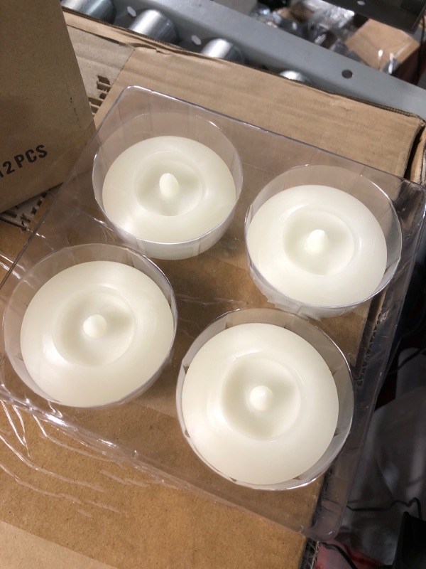 Photo 2 of (READ) Floating Candles 3 inch Wax Flicker LED Floating Candles Flameless (4 PACK) 