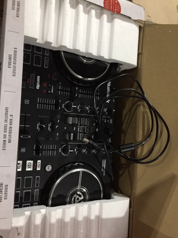 Photo 1 of **SEE CLERK NOTES**
Numark Mixtrack Pro FX – 2 Deck DJ Controller For Serato DJ with DJ Mixer, Built-in Audio Interface, Capacitive Touch Jog Wheels and FX Paddles 2 Decks DJ Controller Only
