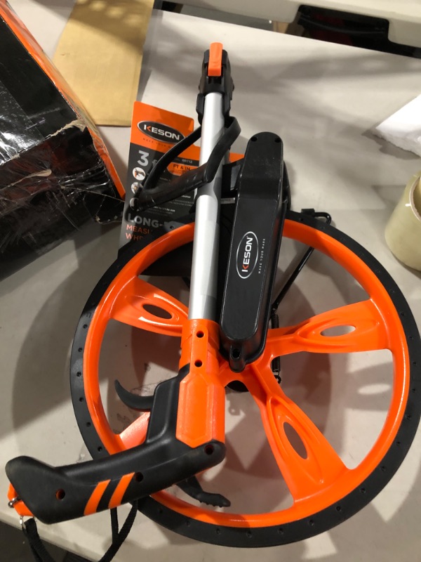 Photo 1 of Keson RRT12 Top Reading Center Line Measuring Wheel with Handle Brake and Reset (Graduations: ft. & in.), 3-Foot & PA35 Paint Marking Wand, Black 12-Inch Diameter Wheel + Applicator
