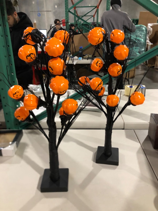 Photo 1 of Heceltt Tabletop Halloween Decorations, 24 Inch Light Up Trees with Pumpkin Hats, 24 LEDs Spooky Trees Battery Operated for Windows, Shelves and Fireplace Indoor, 2 Packs 2PCS Rounded Pumpkins