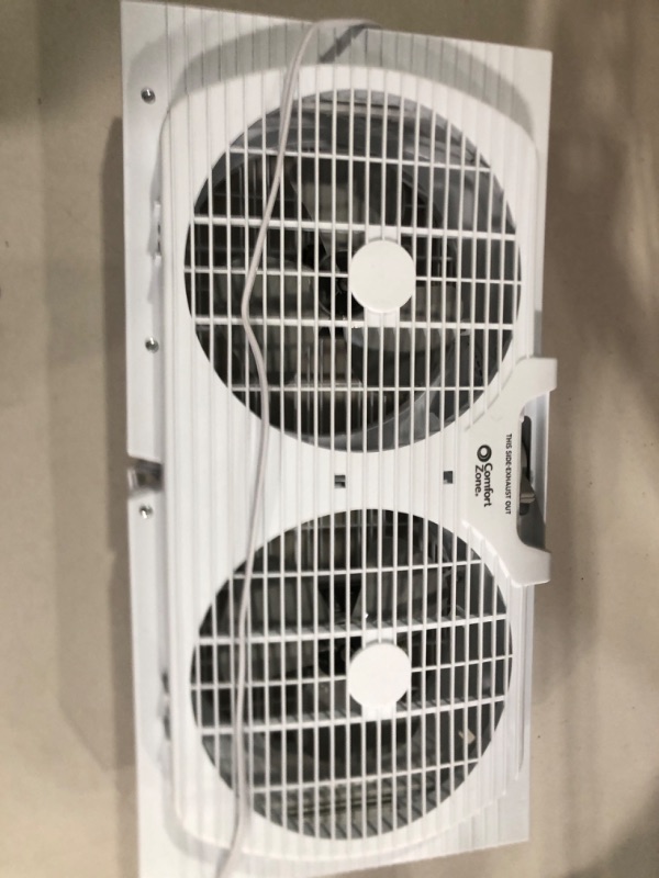 Photo 2 of Comfort Zone CZ319WT 9" Twin Window Fan with Reversible Airflow Control, Auto-Locking Expanders and 2-Speed Fan Switch, White 9" Portable Twin Window Fan Window Fan