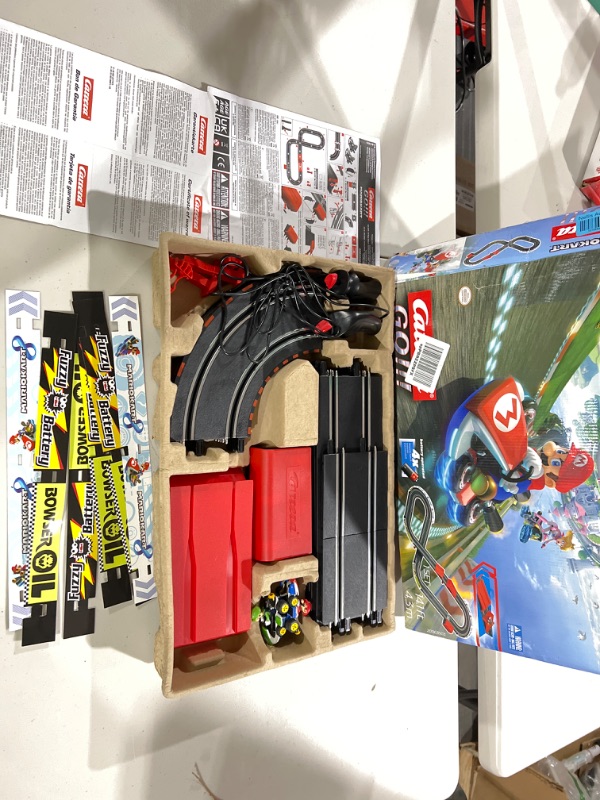 Photo 3 of Carrera GO!!! 63503 Official Licensed Mario Kart Battery Operated 1:43 Scale Slot Car Racing Toy Track Set with Jump Ramp Featuring Mario and Luigi for Kids Ages 5 Years and Up