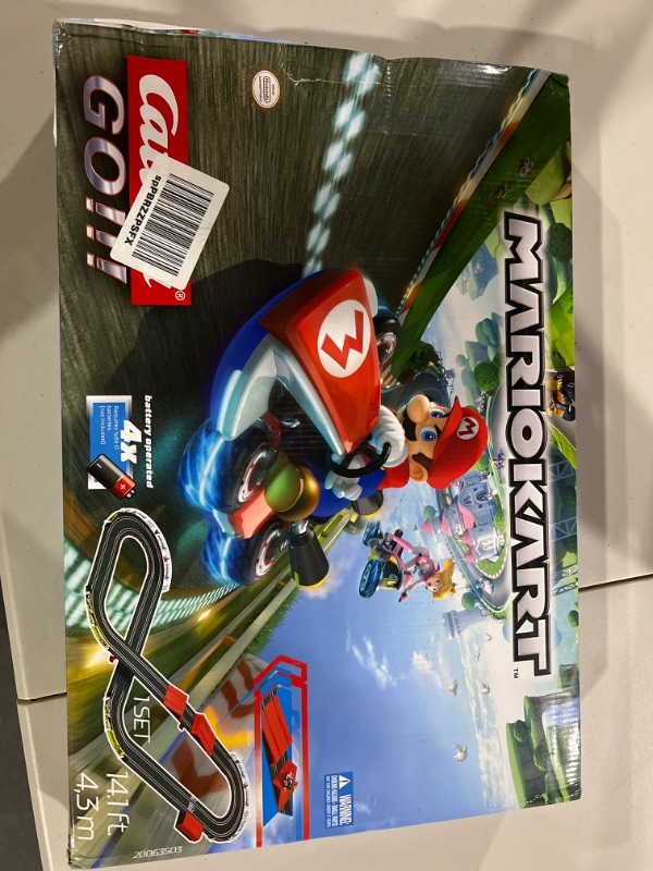 Photo 2 of Carrera GO!!! 63503 Official Licensed Mario Kart Battery Operated 1:43 Scale Slot Car Racing Toy Track Set with Jump Ramp Featuring Mario and Luigi for Kids Ages 5 Years and Up