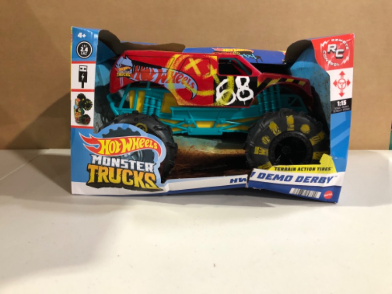 Photo 3 of ?Hot Wheels RC Monster Trucks 1:15 Scale HW Demo Derby, 1 Remote-Control Toy Truck with Terrain Action Tires