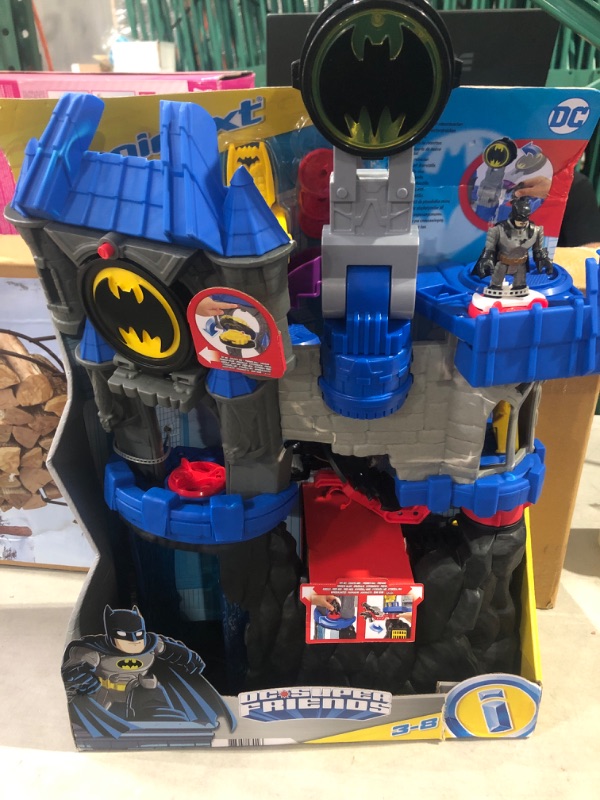 Photo 2 of Imaginext DC Super Friends Batman Toy, Wayne Manor Batcave Playset with Batman Figure Batcyle and Accessories