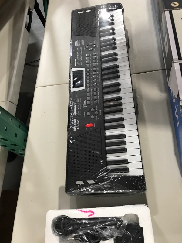 Photo 1 of biikoosii 61 key piano keyboard,keyboard piano for beginners keyboard piano with built-in dual speakers and microphone portable digital electric piano
