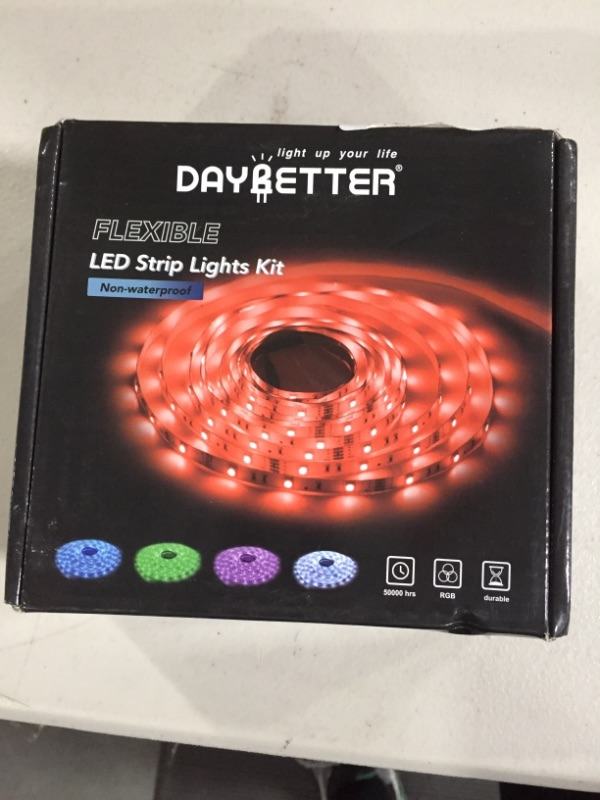 Photo 2 of DAYBETTER Led Strip Lights 32.8ft Kit with Remote and Power Supply Color Changing