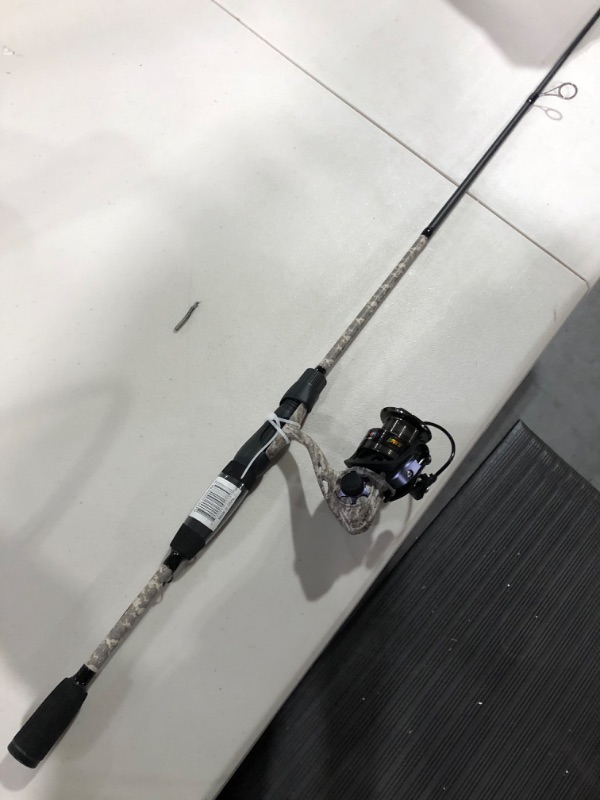 Photo 1 of American Hero Camo Spinning Reel and Fishing Rod Combo, 2-Piece All-Purpose IM7 Graphite Rod Blank with Split Grip EVA Handle, 1-Piece Graphite Reel Frame, Right or Left-Hand Retrieve Camo 300 6'0" Medium Spinning Combo