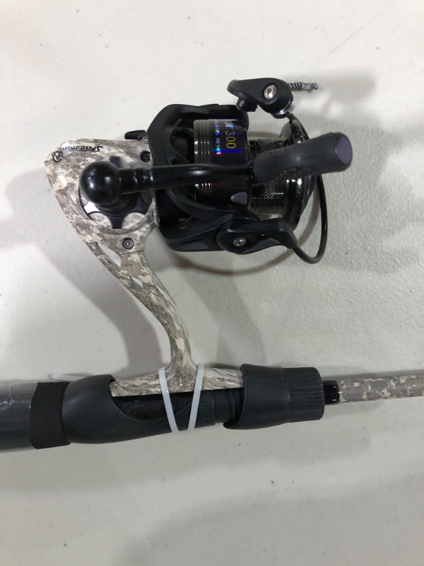 Photo 3 of American Hero Camo Spinning Reel and Fishing Rod Combo, 2-Piece All-Purpose IM7 Graphite Rod Blank with Split Grip EVA Handle, 1-Piece Graphite Reel Frame, Right or Left-Hand Retrieve Camo 300 6'0" Medium Spinning Combo