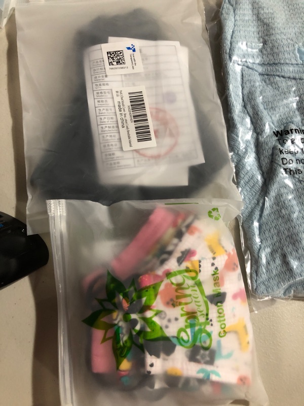 Photo 1 of assorted clothing and face mask bundle 