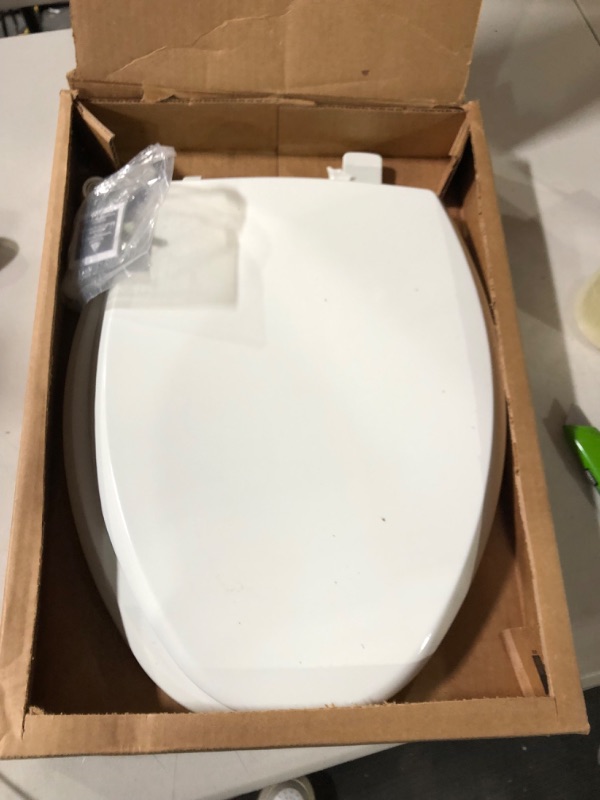 Photo 4 of  Slow-Close, Removable Enameled Wood Toilet Seat- white