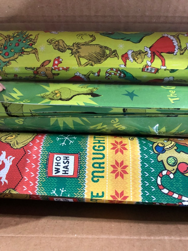 Photo 3 of American Greetings Christmas Wrapping Paper with Cut Lines Bundle, The Grinch (3 Rolls, 105 sq. ft.)