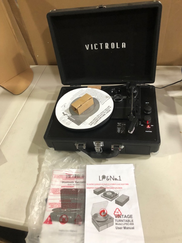 Photo 2 of Victrola Vintage 3-Speed Bluetooth Portable Suitcase Record Player with Built-in Speakers | Upgraded Turntable Audio Sound| Includes Extra Stylus | Brown Brown Record Player