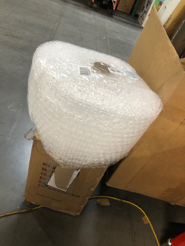 Photo 2 of Amazon Basics Perforated Bubble Cushioning Wrap - Medium 5/16", 12-Inch x 100-Foot Long Roll