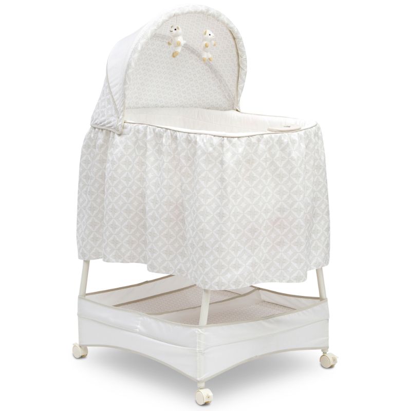 Photo 1 of Delta Children Soothe and Glide Bassinet, Illusions (1830506)