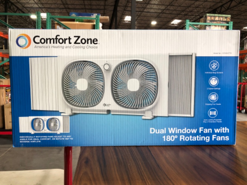 Photo 2 of Comfort Zone 9" Dual Window Fan with 180° Rotating Fans, 2-Speeds, Plastic Removable Bug Screen, Individually Rotating Fan Heads, White