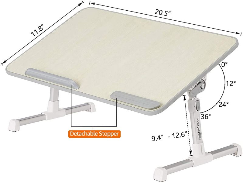 Photo 2 of Amazon Basics Adjustable Laptop Tray Table - Lap Desk Fits up to 17-Inch Laptop - Medium & Aluminum Portable Foldable Laptop Support Stand for Laptops up to 15 Inches, Silver Medium Table + Stand, Silver