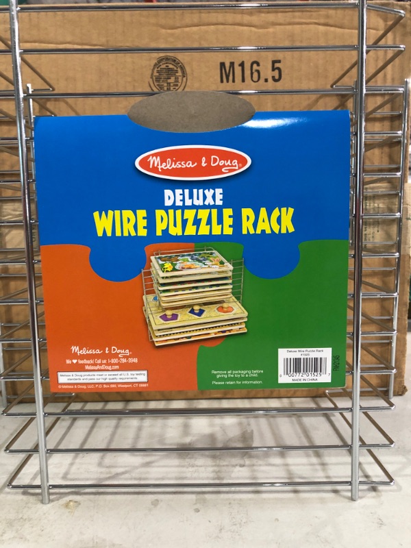 Photo 2 of Melissa & Doug Deluxe Metal Wire Puzzle Storage Rack for 12 Small and Large Puzzles