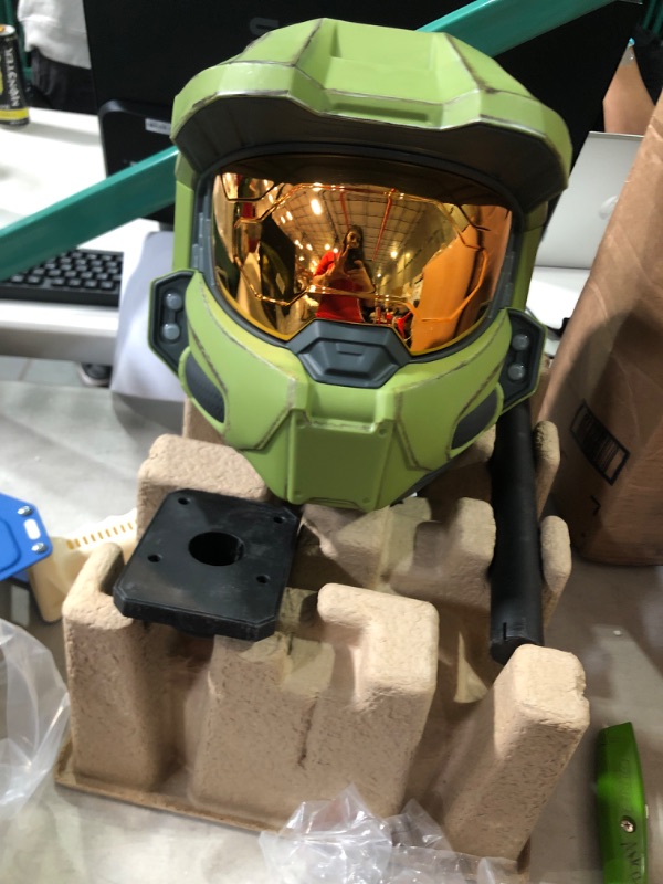 Photo 2 of HALO Master Chief Deluxe Helmet with Stand - LED Lights on Each Side - Battle Damaged Paint - One Size Fits Most - Build Your Halo Universe, Green