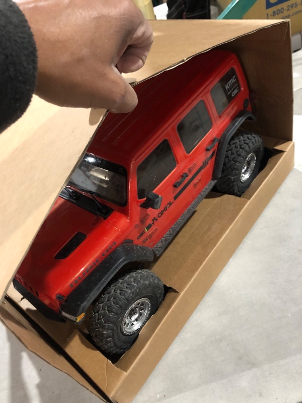 Photo 4 of Axial 1/10 SCX10 III Jeep JLU Wrangler with Portals RTR, Orange, AXI03003T2