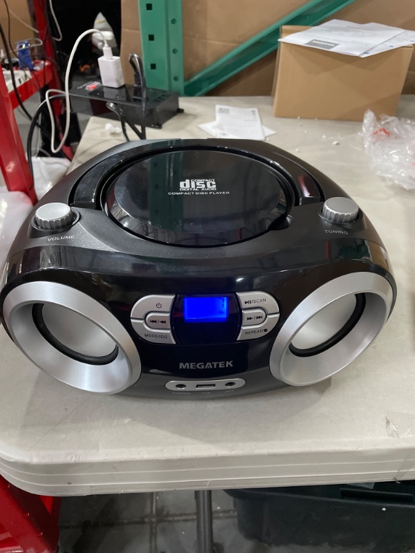 Photo 2 of MEGATEK Portable CD Player/Radio/Bluetooth Boombox with Enhanced Stereo Sound, CD-R/CD-RW/MP3/WMA Playback, USB Port, AUX Input, Headphone Jack, Backlit LCD Display, AC/Battery Operated Black