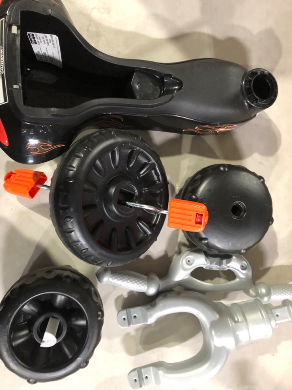 Photo 1 of Fisher-Price Harley-Davidson Tricycle with Handlebar Grips and Storage Area, Multi-Terrain Tires, Tough Trike [Amazon Exclusive]