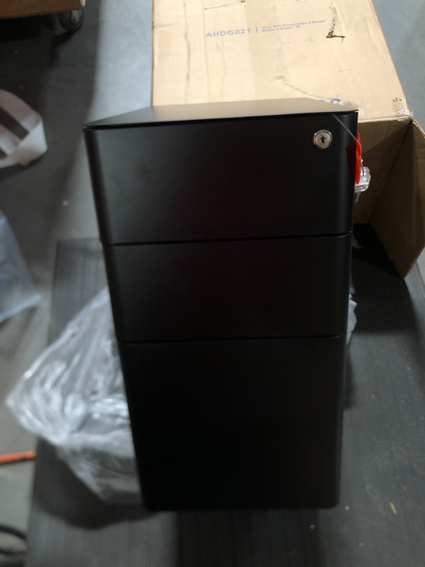 Photo 1 of DEVAISE 3-Drawer Slim File Cabinet, Vertical Filing Cabinet, Fully Assembled Except Casters, Black Black 11.8"W x 17.7"D x 23.2"H