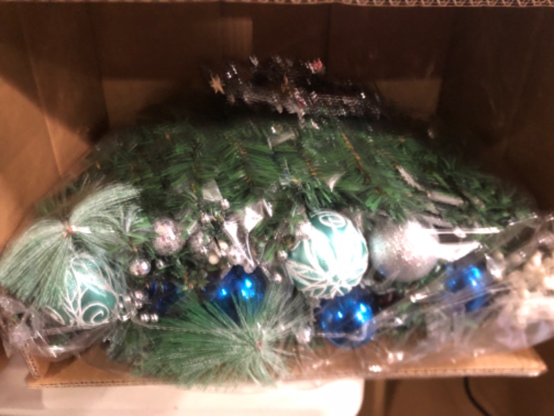 Photo 2 of Christmas Garland with LED Lights Battery Operated, 6FT Green Garland with Blue Flower and Ball Ornament 15.5 x 11 x 6 inches
