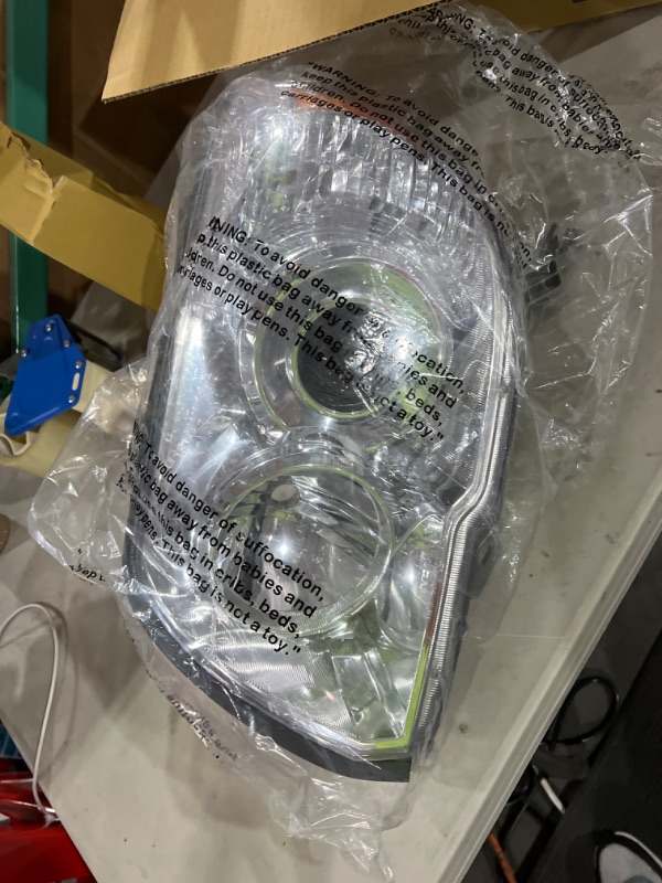 Photo 2 of TYC Left Headlight Assembly Compatible with 2006-2009 Toyota 4 Runner Driver Side