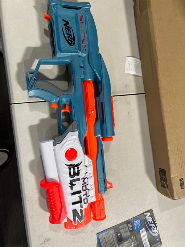 Photo 1 of NERF Elite 2.0 Motoblitz Blaster with Scope, Motorized 10-Dart Blasting, Airblitz 6 Darts, 22 Darts, Outdoor Toys for 8 Year Old Boys & Girls

It is missing a magazine, the bullets ***