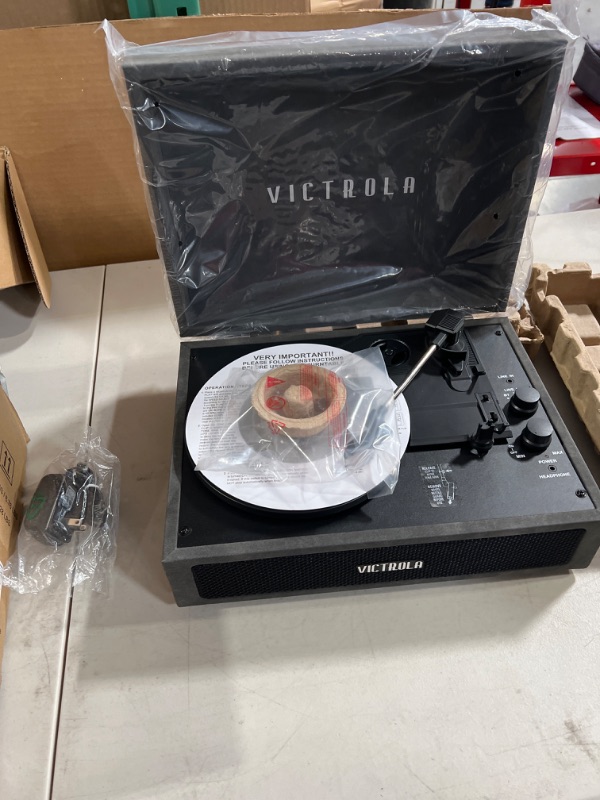 Photo 1 of Victrola Vintage 3-Speed Bluetooth Portable Suitcase Record Player with Built-in Speakers | Upgraded Turntable Audio Sound| Includes Extra Stylus | Lambskin (VSC-580BT-LGR)