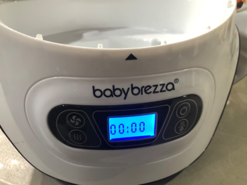 Photo 2 of Baby Brezza Baby Bottle Sterilizer and Dryer Machine – Electric Steam Sterilization - Universal Fit - Pacifiers, Glass, Plastic, and Newborn Feeding Bottles