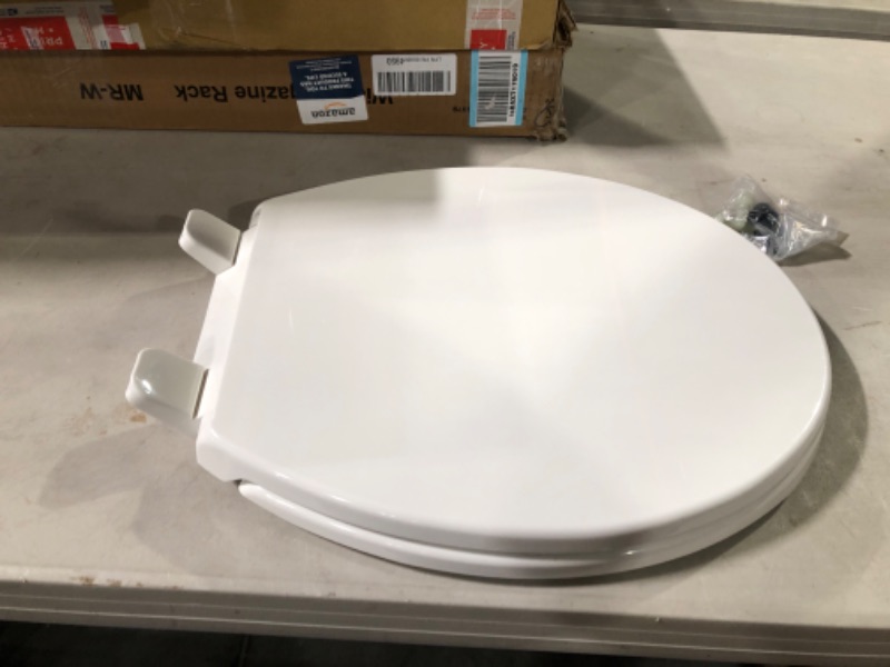 Photo 3 of Kohler 20111-0 Brevia Round Toilet Seat, with Grip-Tight Bumpers, Quiet-Close Seat, Quick-Attach Hardware, White Round White Quiet-Close