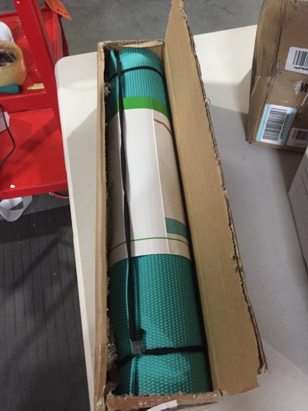 Photo 2 of Gaiam Essentials Premium Yoga Mat with Yoga Mat Carrier Sling (72"L x 24"W x 1/4 Inch Thick) Teal