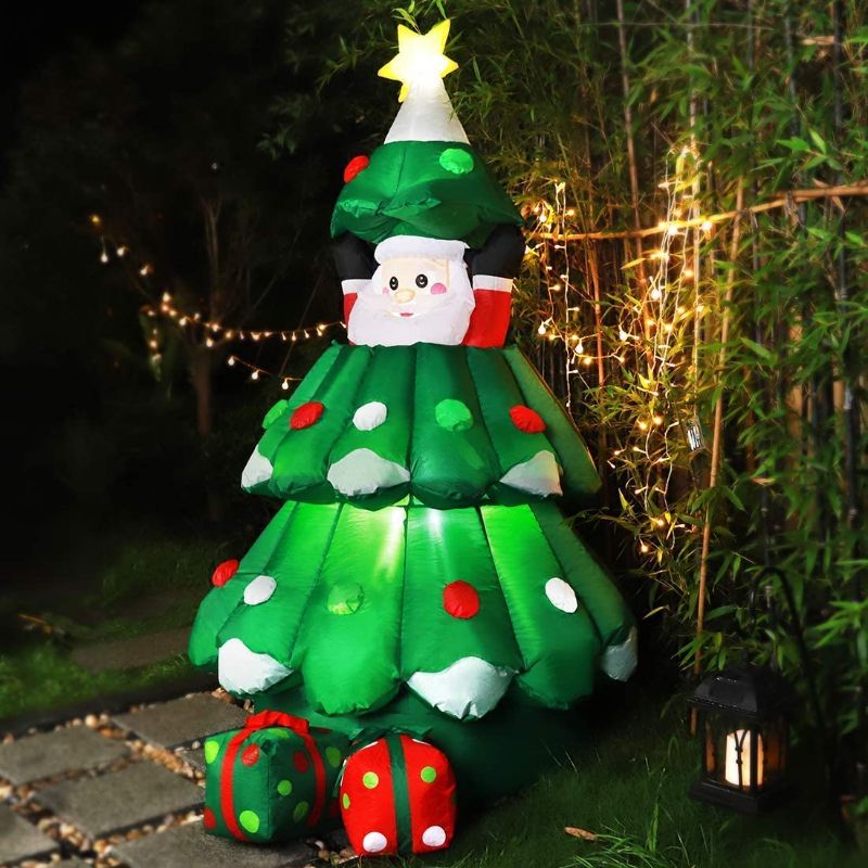 Photo 1 of VIVOHOME Christmas LED Lighted 6ft Height Inflatable Christmas Tree with Pop up Santa and 2 Gift Boxes & 8ft Height Inflatable Christmas Tree with Penguins and Red Ladder Blow up Outdoor Decoration