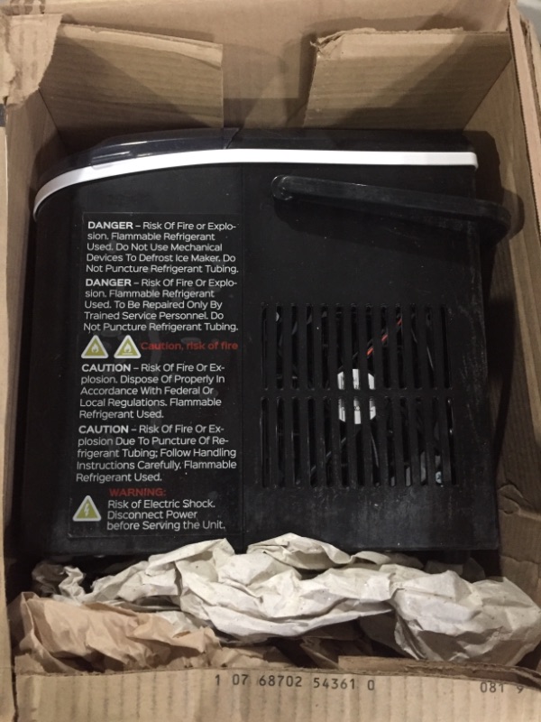 Photo 1 of Silonn Countertop Ice Maker Machine, Portable Ice Makers Countertop with Handle, Makes up to 27 lbs. of Ice Per Day, 9 Cubes in 7 Mins, Self-Cleaning Ice Maker with Ice Scoop and Basket Black Ice Maker