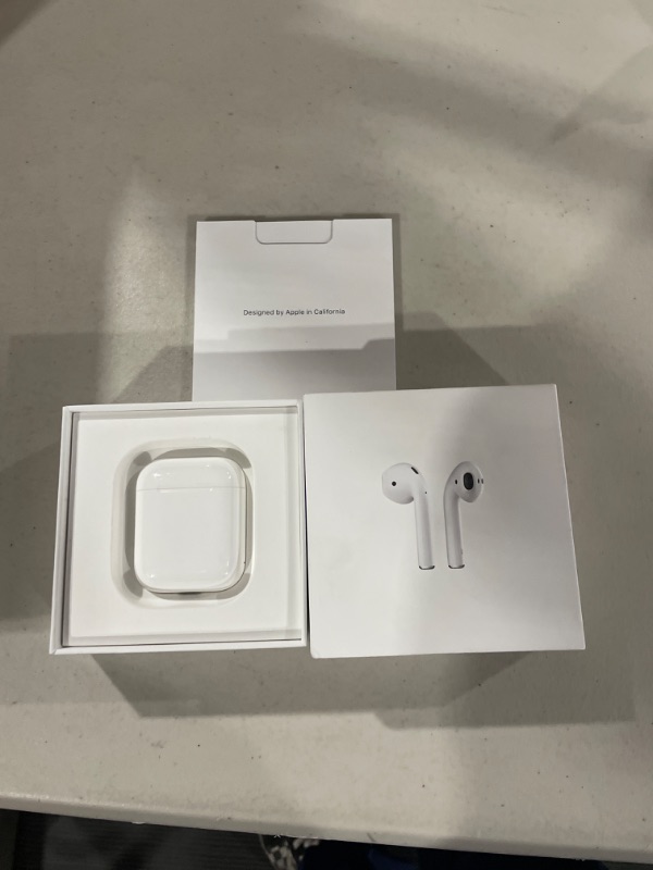 Photo 2 of Apple AirPods with Charging Case (Latest Model)