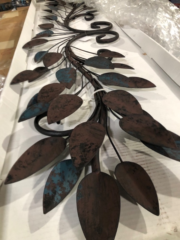 Photo 2 of Deco 79 Metal Leaf Wall Decor, 48" x 1" x 12", Blue Blue 48" x 1" x 12"